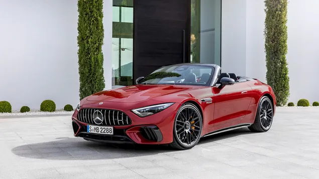 Mercedes-AMG SL63 2022 back and side view red color in front of the building download