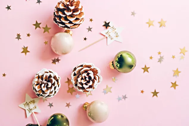 Taustakuva Hyvää joulutervehdys vaaleanpunaisella taustalla tähdillä, koruilla ja käpyillä 4K