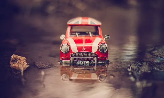 Miniatuurfoto van een klassieke rood-witte legende en zijn weerspiegeling in het water download