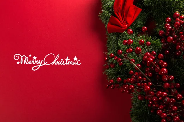 Mistletoe and a Merry Christmas Greetings in a red background