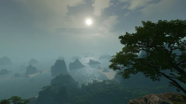 岩だらけの海岸の風景に霧のかかった朝日 2K 壁紙