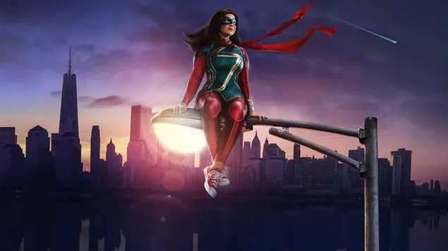 Ms. Marvel sitzt bei Sonnenaufgang in einem Laternenpfahl mit Großstadthintergrund herunterladen