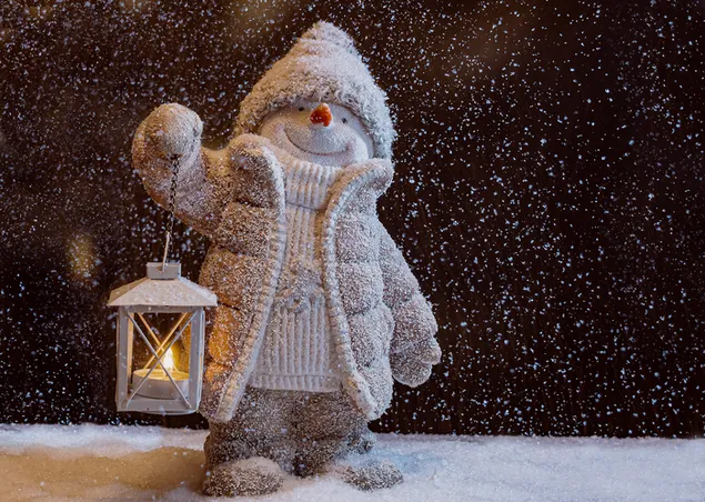 muñeco de nieve con lámpara de aceite