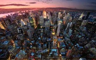 Tapeta Panorama budov New York City a světla při východu slunce 2K