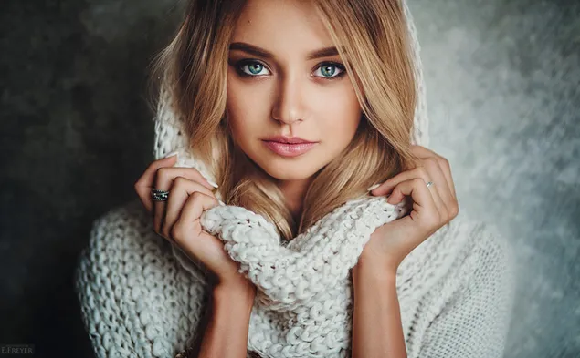  Nice girl in knitted sweater