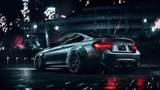 BMW gris metálico nocturno estacionado en la calle 6K fondo de pantalla