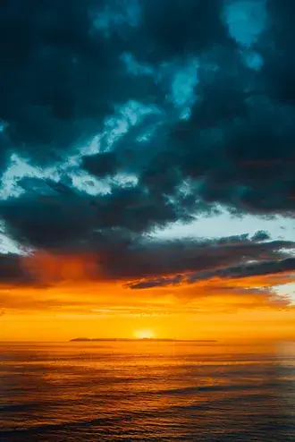 vue sur le coucher de soleil sur l'ocean telechargement