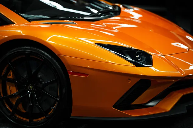 Taustakuva Oranssi lamborghini urheiluauto edessä 4K