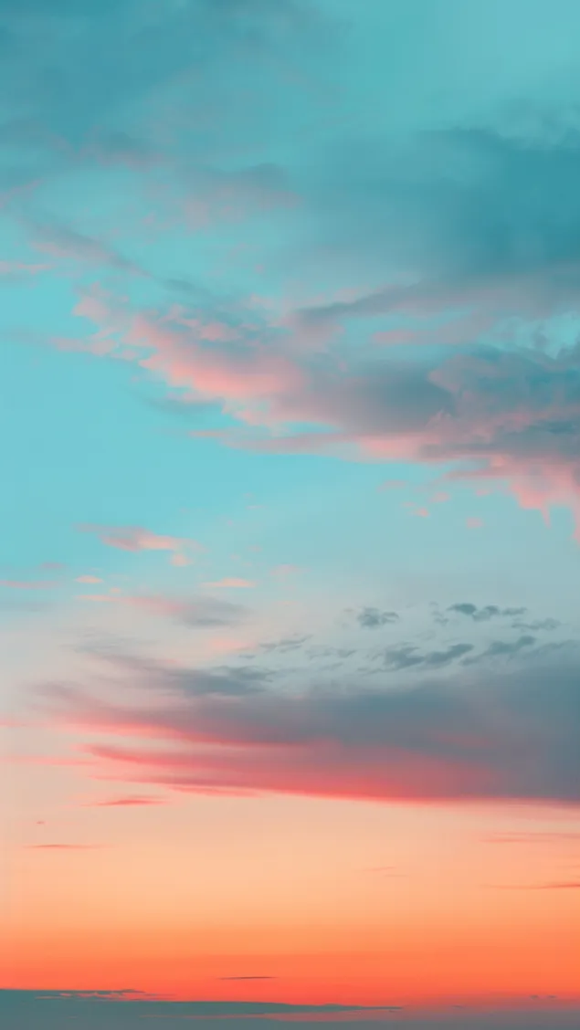 pastellivarinen auringonlasku ja unelmoivat pilvet lataa