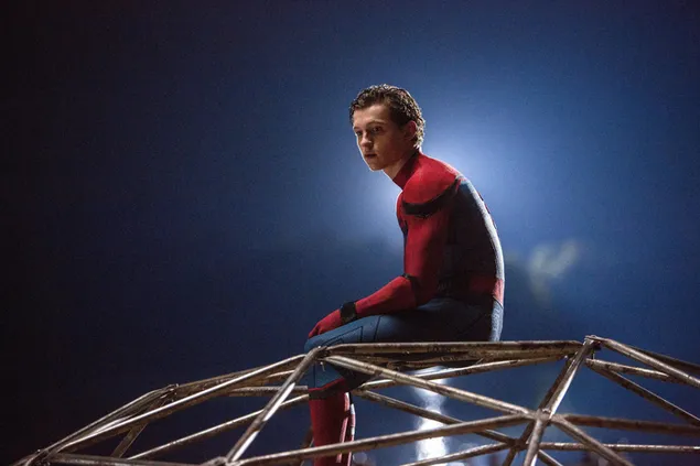 Peter Is Sitting In The Swing Taking Off His Spidy  Mask