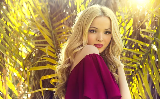 Photo of dove cameron, woman in red dress and blond hair, Palm trees and sunny background