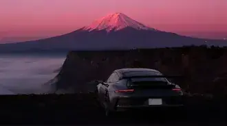porsche 911 gt3 pri vychodu slunce na hore fudzi stahnout