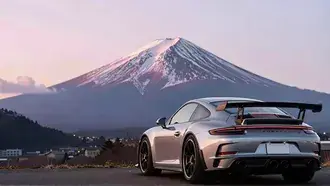 porsche 911 gt3 rs pod horou fudzi pri zapadu slunce stahnout