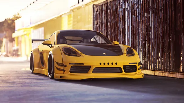 Muat turun Porsche: Kereta sport kuning & hitam Cayman