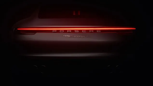 Logo belakang Porsche di area gelap unduhan