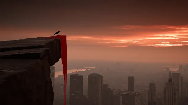 夕暮れの街を見下ろす崖っぷちのカラス 2K 壁紙