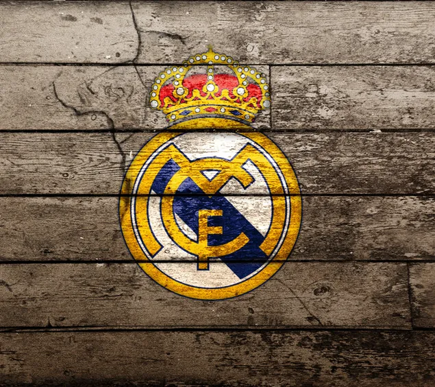 Logotipo del club de fútbol Real Madrid en un piso de madera 2K fondo de pantalla