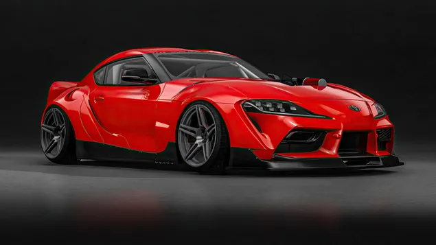 Rotes Farbdesignwunder Toyota Supra im schwarzen Bereich 4K Hintergrundbild