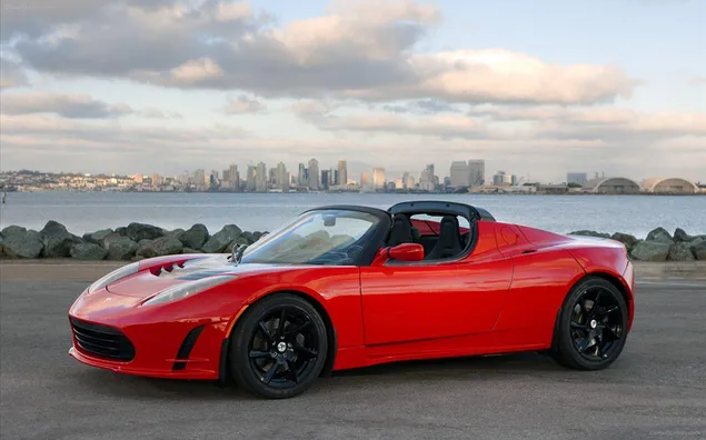 parkta kirmizi cabrio tesla roadster indir