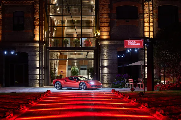 紅色法拉利 296 gtb 紅燈在建築物前的前視圖 8K 壁紙
