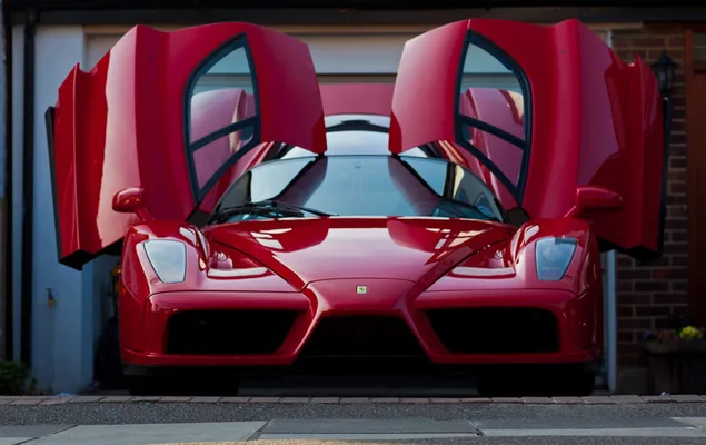 Ferrari Enzo vermell al garatge baixada