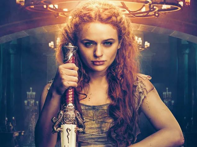 Red-haired beautiful actress character holding a sword in front of the backdrop of The Princess movie