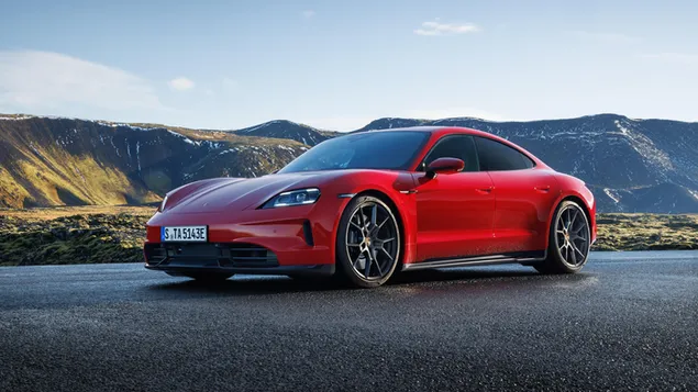 descarcare porsche taycan rosu intr-o zona cu vederi minunate
