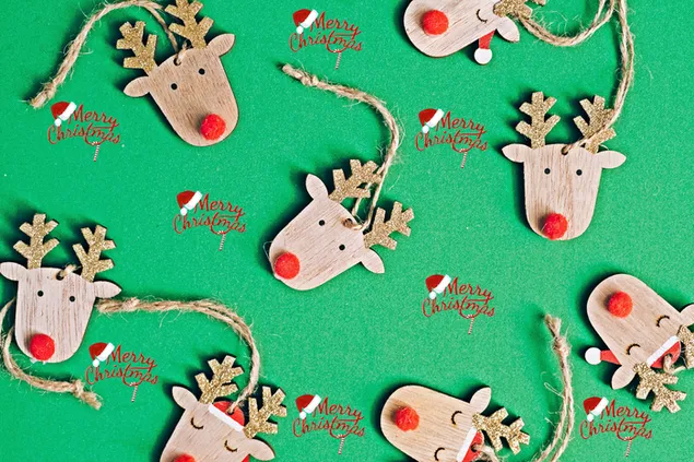 Reindeer hanging ornaments in green background 