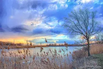 zonsondergang aan de rivier download