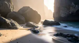 rugged rocks line a tranquil sandy shore, where gentle waves and golden sunlight create a mysterious, peaceful seascape atmosphere. download