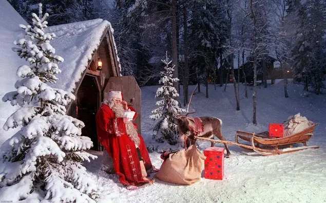Santa preparándose para entregar los regalos de Navidad