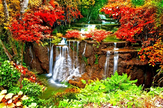 Scenic view of a waterfall in autumn download