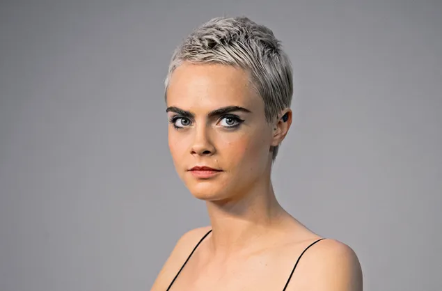 Short gray hair look of model and actress Cara Delevingne