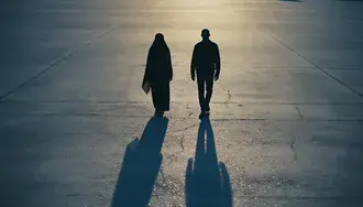 silhouettes walking towards light: hopeful path download