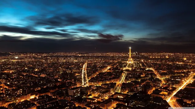 Símbolo del país de Francia, París, torre Eiffel en las luces nocturnas de la ciudad
