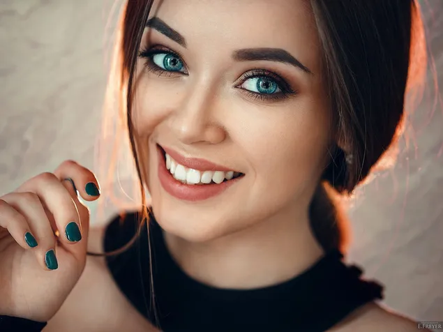 Smiling blue-eyed girl