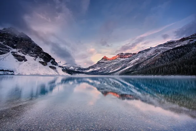Snowy mountains and sunrise lake reflection 6K wallpaper