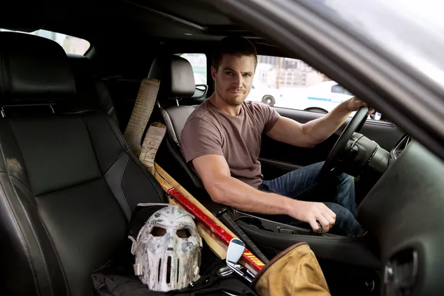 Stephen Amell On A Sports Car 4K wallpaper