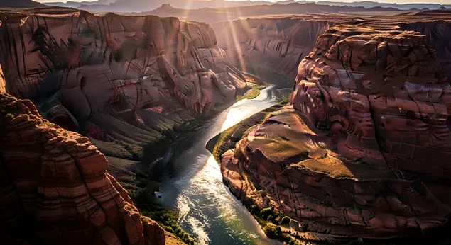 阳光照耀下的峡谷河景——壮丽的自然风光 4K 壁纸