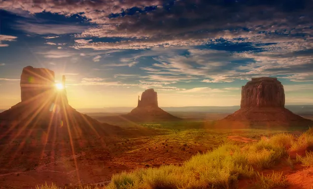 Sonnenstrahlen in den Felsen 4K Hintergrundbild