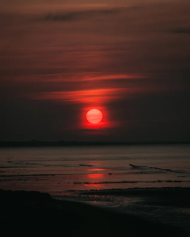 Zonsondergang op het strand HD