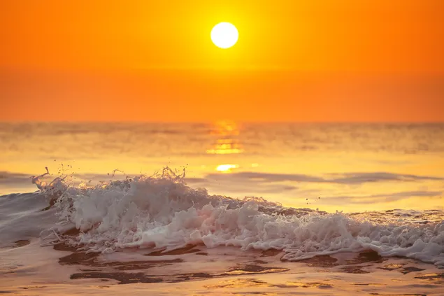 Solnedgang i havet 4K tapet
