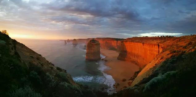 พระอาทิตย์ตกที่ถนนสายมหาสมุทรอันยิ่งใหญ่ของอัครสาวกสิบสองคน 4K วอลเปเปอร์