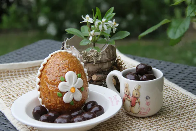 Sweet chocolate easter snack with a white flower plant