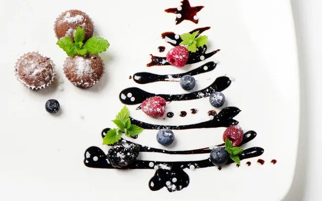 Dulces y frutas en Navidad en un plato
