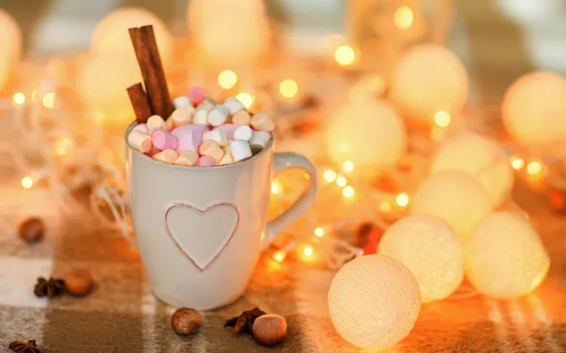 Sweets inside heart shaped mug and small globe lights download
