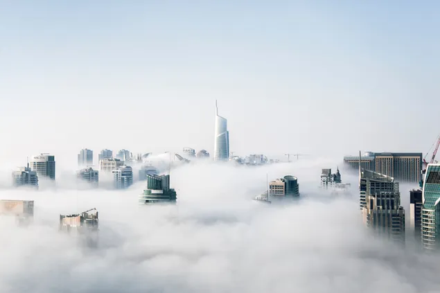 Gedung-gedung tinggi di tengah kabut kota Dubai 4K wallpaper