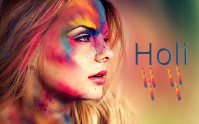 De smukke farver på Holi forstærker ansigtet på en smuk pige download