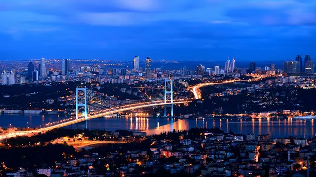 The lights of Istanbul, which is a bridge between asia and europe, are reflected in the marmara sea.