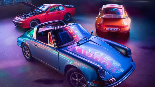 Three new motel Porsche cars 2K wallpaper